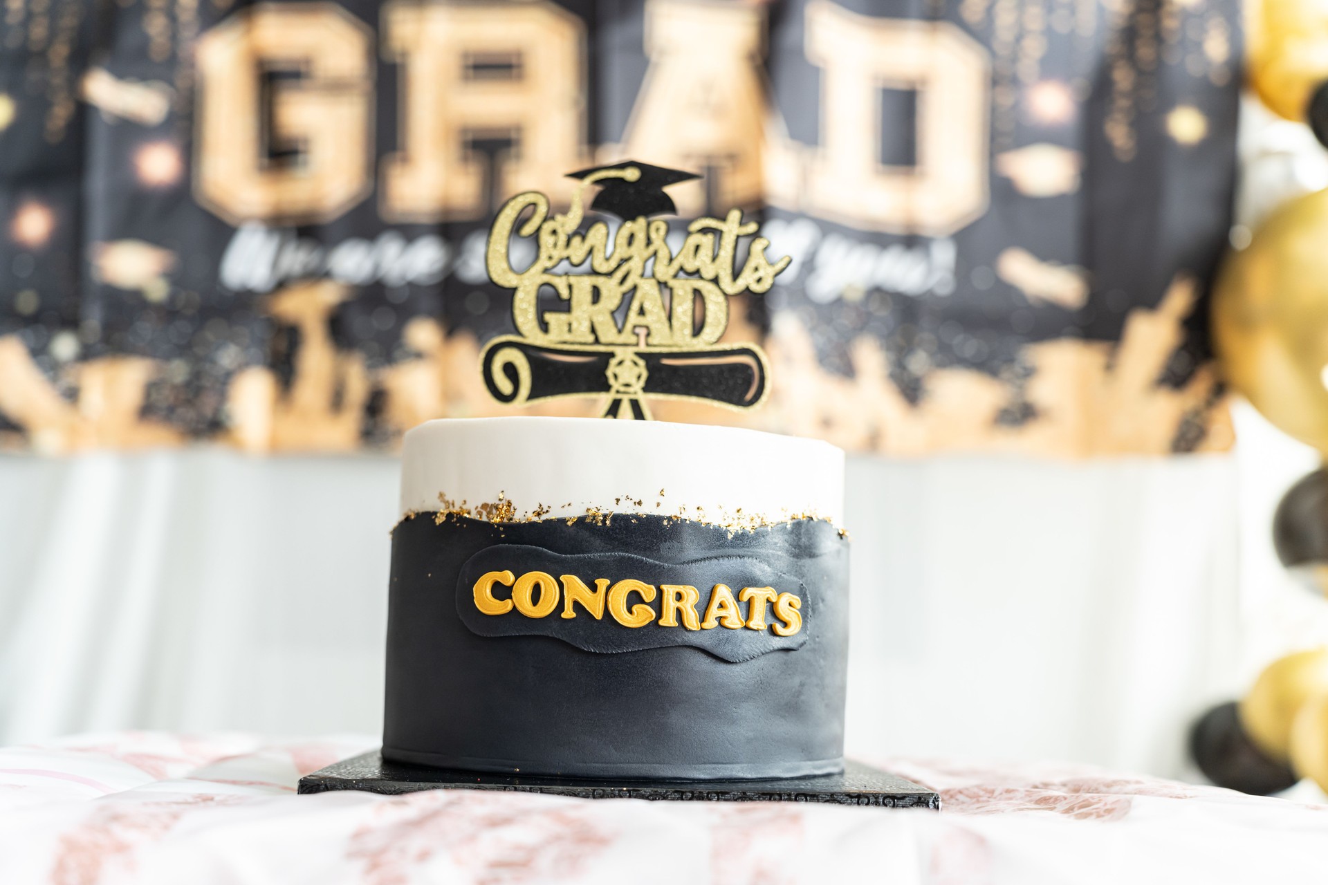 Graduation cake with decorations - close up view